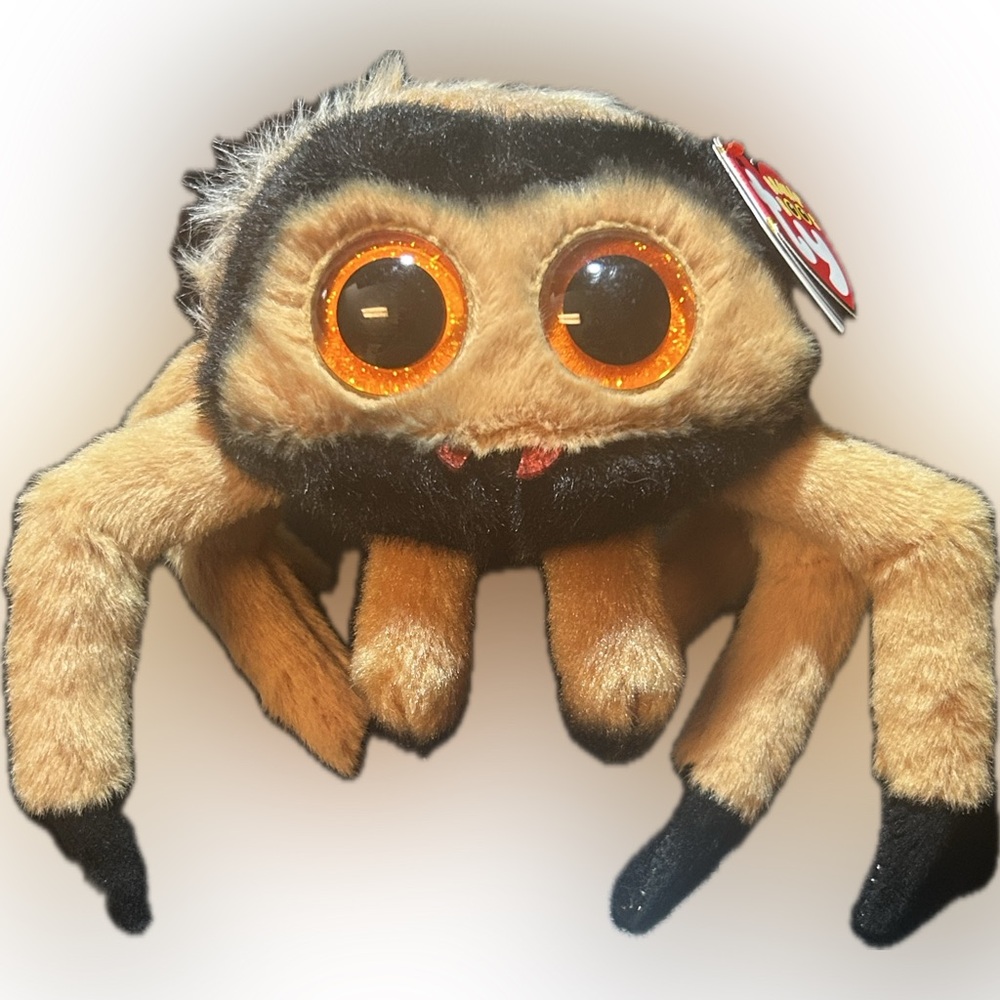 Ty Plush Spider with Orange Eyes and Tan Fur named Godfrey. DOB 10/30.